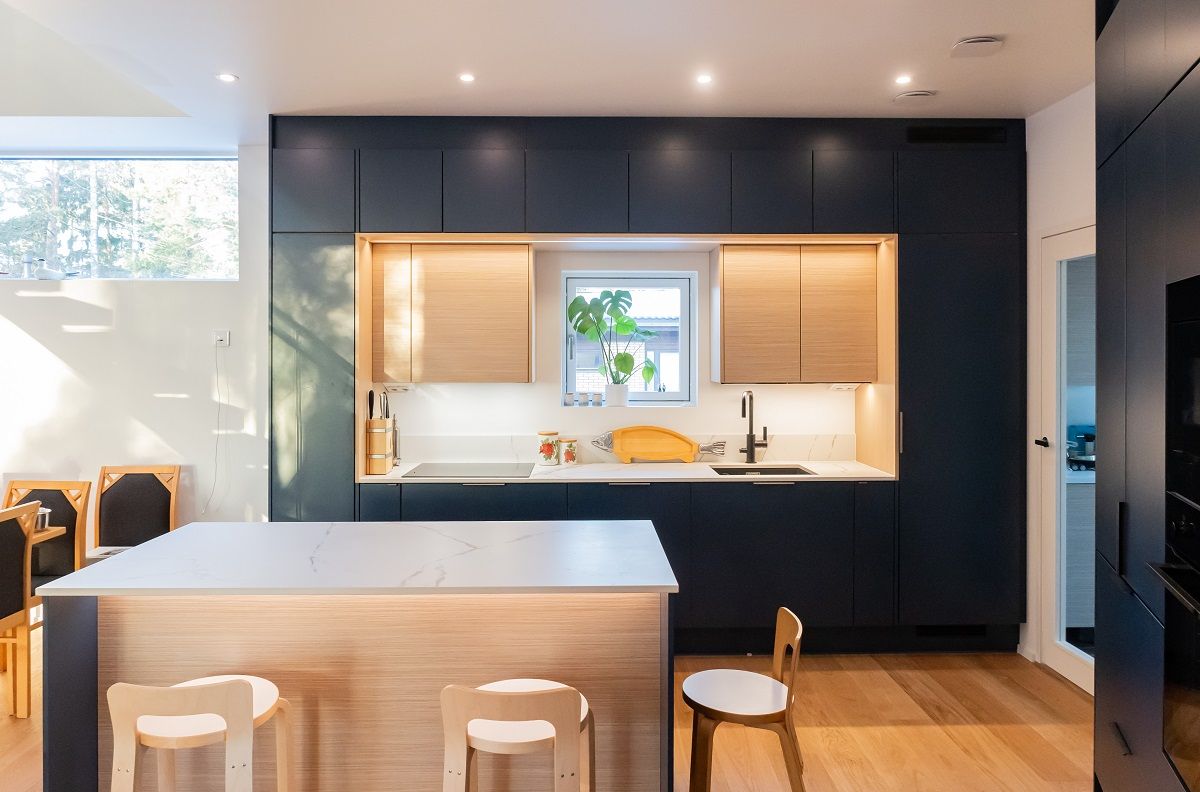 Gorgeous kitchen lighting on the worktops to illuminate cooking and on the ceiling above the work area are just right.